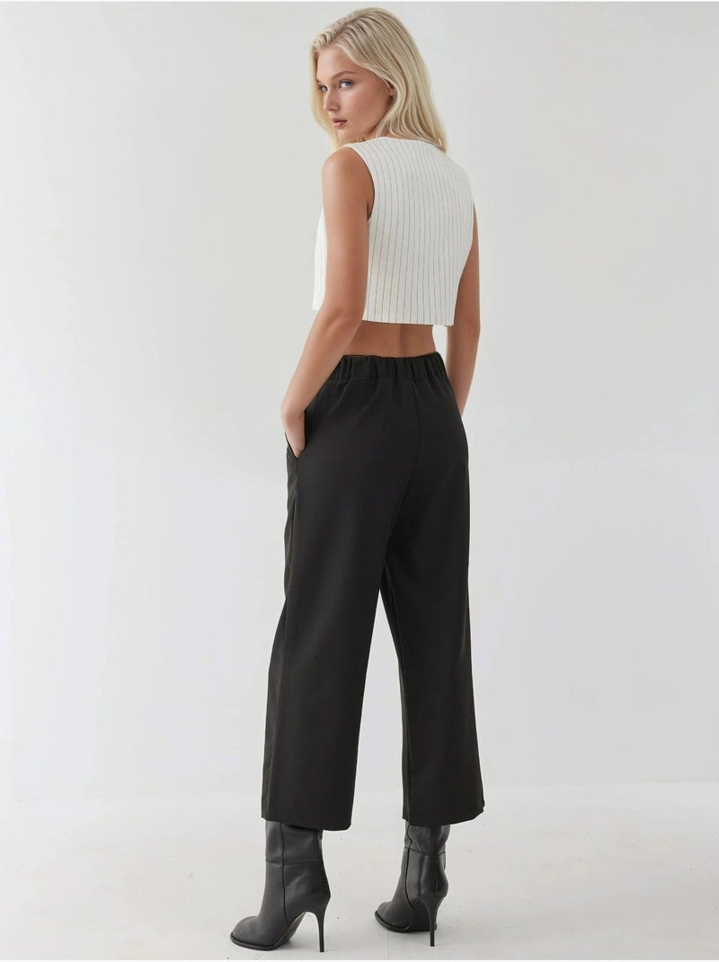 Pantalon taille haute à boutons Noir - Kiabi