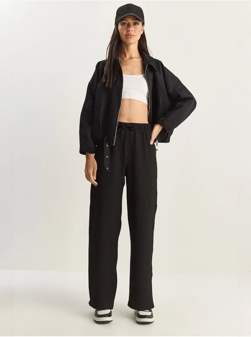 Pantalon taille haute à jambes larges en seersucker lucci Noir - Kiabi