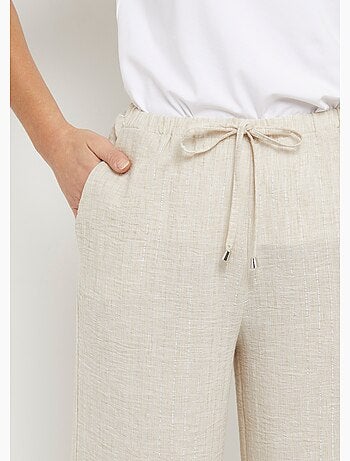 Pantalon tailleur rayé aspect irrégulier