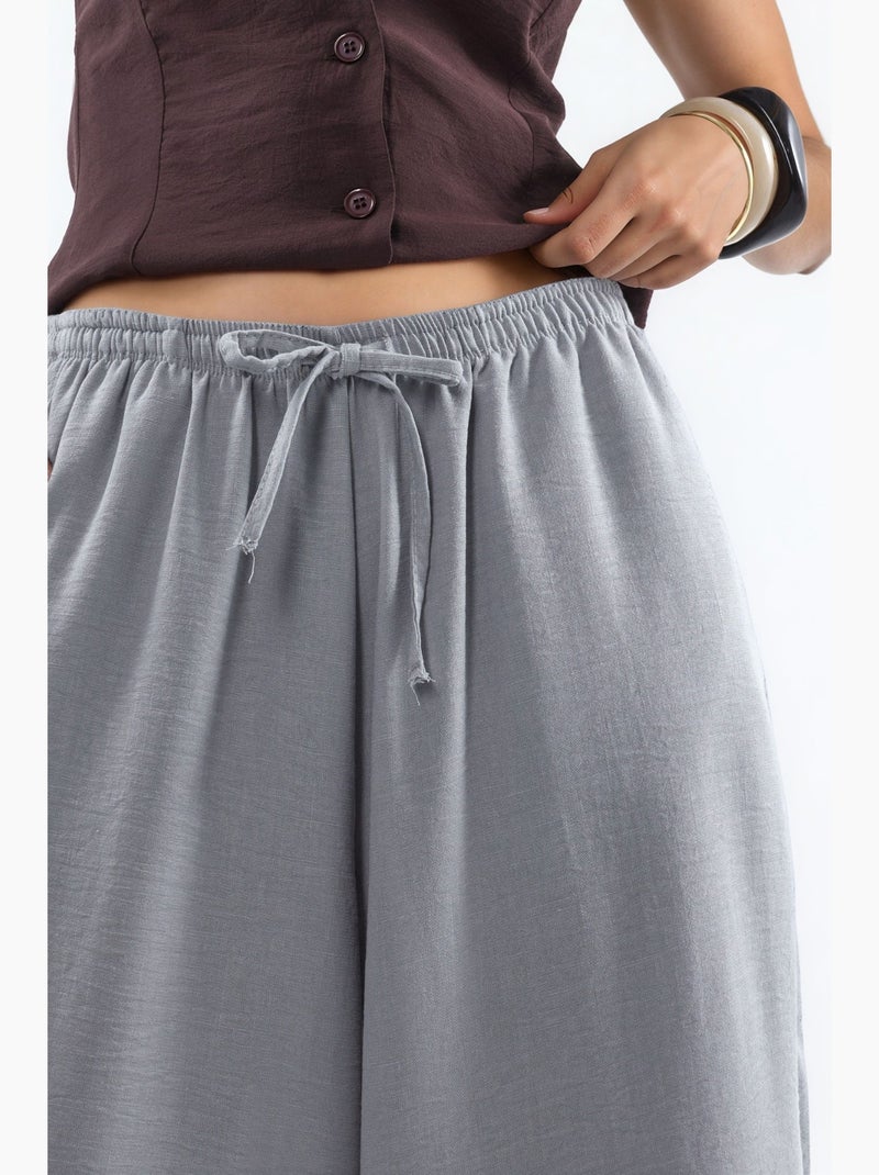 Pantalon tissé à jambe large avec taille à cordon de serrage busem Gris clair - Kiabi
