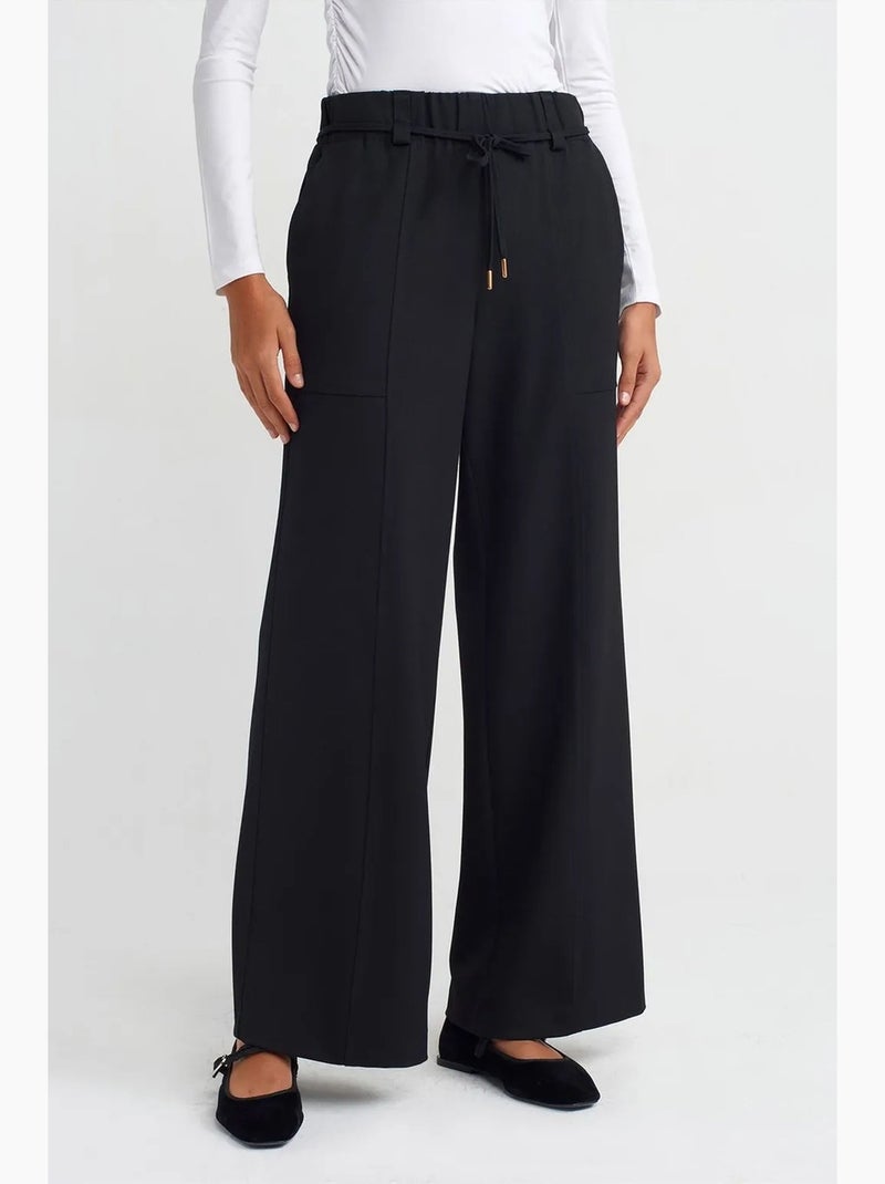 Pantalon tissé à jambe large et taille élastique dilvin Noir - Kiabi