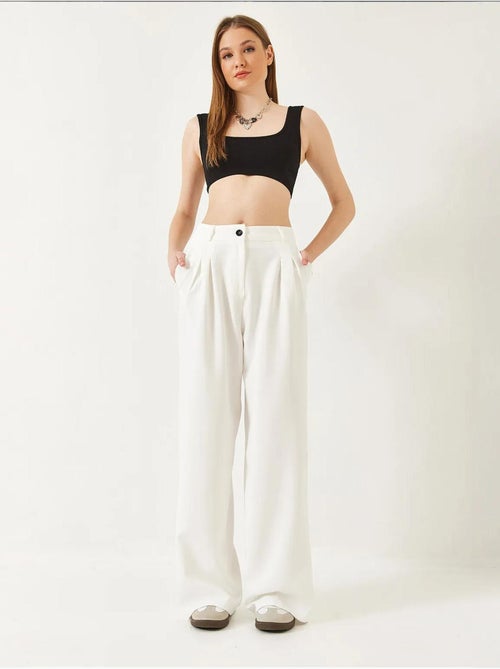 Pantalon tissé masculin à jambe large lucci - Kiabi Pantalon tissé masculin à jambe large lucci - Kiabi