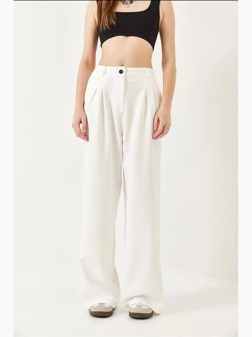 Pantalon tissé masculin à jambe large lucci - Kiabi Pantalon tissé masculin à jambe large lucci - Kiabi