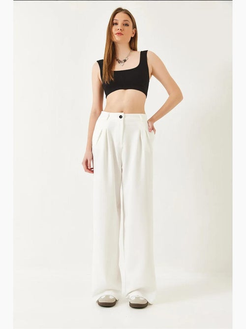 Pantalon tissé masculin à jambe large lucci - Kiabi Pantalon tissé masculin à jambe large lucci - Kiabi