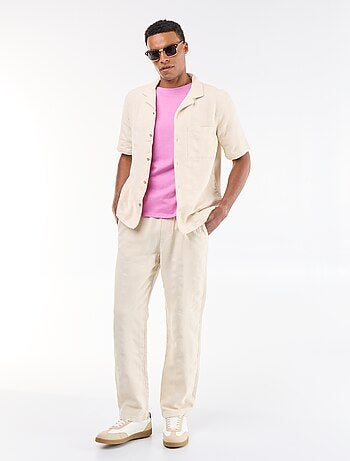 Pantalon uni en matière texturée
