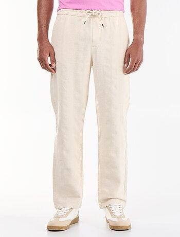 Pantalon uni en matière texturée