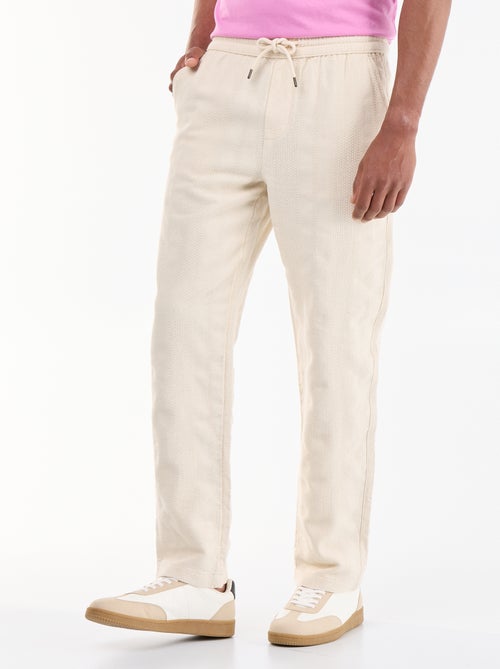 Pantalon uni en matière texturée - Kiabi