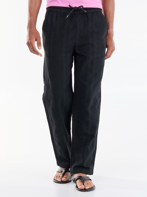Pantalon uni en matière texturée - Kiabi