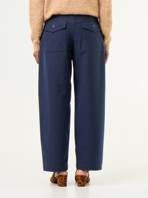 Pantalon uni forme large - Kiabi Pantalon uni forme large - Kiabi
