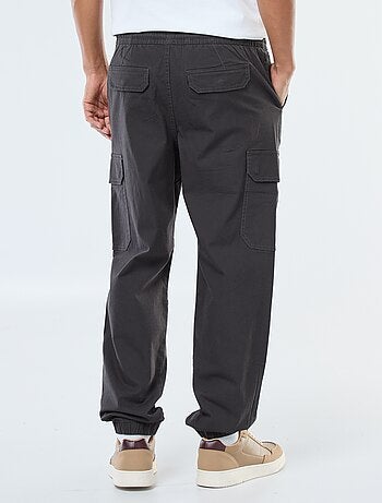 Pantalon uni multipoches avec taille élastiquée