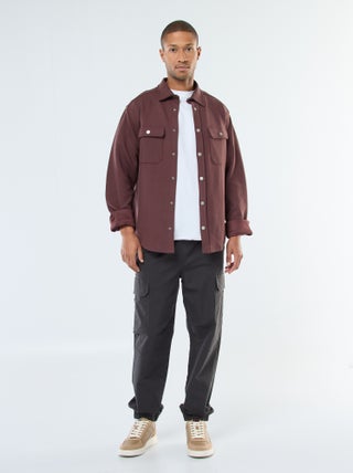 Pantalon uni multipoches avec taille élastiquée