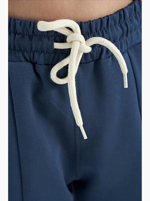 Pantalon unisexe junior en mélange de coton tommy - Kiabi Pantalon unisexe junior en mélange de coton tommy - Kiabi