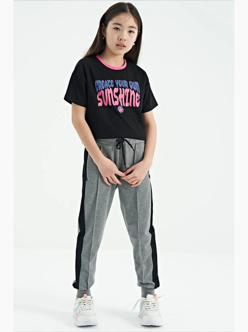 Pantalon unisexe junior en mélange de coton tommy - Kiabi Pantalon unisexe junior en mélange de coton tommy - Kiabi