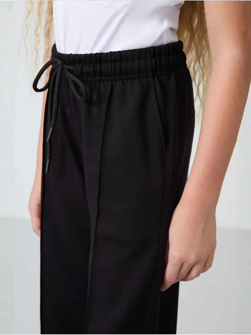 Pantalon unisexe junior en mélange de coton tommy Noir - Kiabi