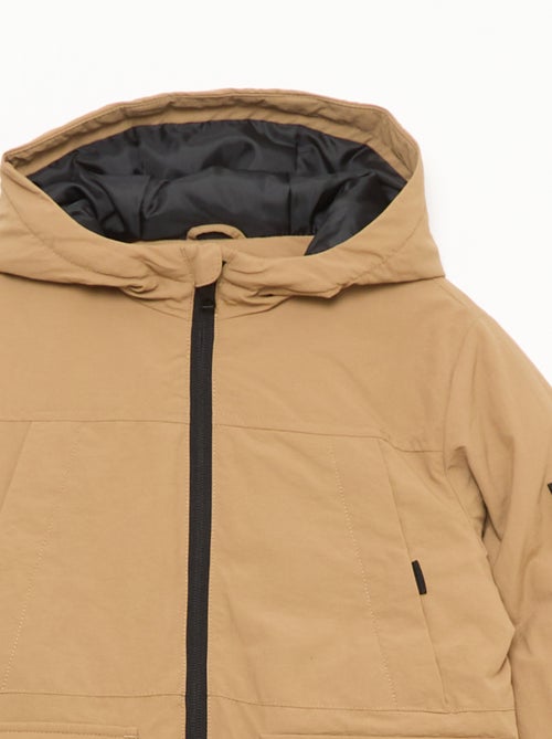 Parka légère à capuche avec 2 poches soufflées à rabat - Kiabi