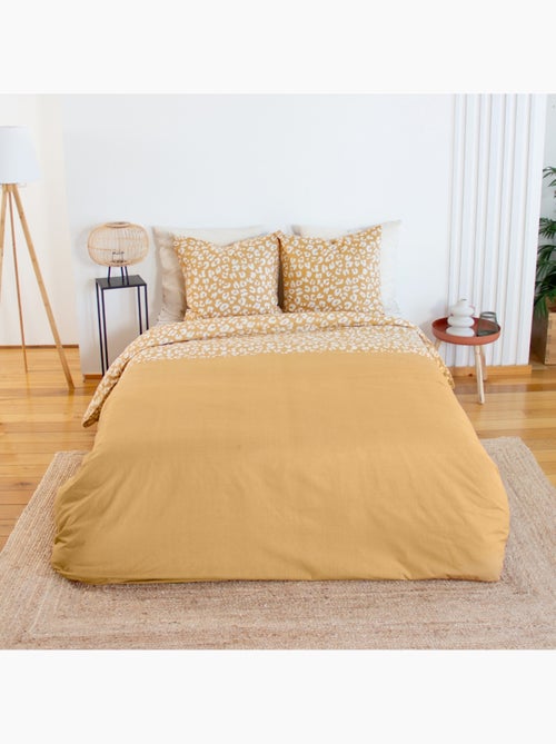 Parure de lit coton réversible 2 places imprimé léopard jaune Juliette - Kiabi Parure de lit coton réversible 2 places imprimé léopard jaune Juliette - Kiabi