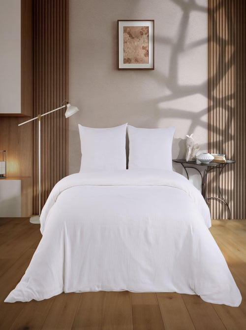 Parure housse de couette et taies d'oreiller gaze de coton blanc - Kiabi Parure housse de couette et taies d'oreiller gaze de coton blanc - Kiabi