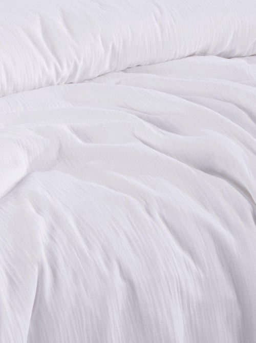 Parure housse de couette et taies d'oreiller gaze de coton blanc - Kiabi Parure housse de couette et taies d'oreiller gaze de coton blanc - Kiabi