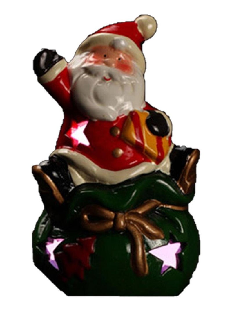 Pere noel sur sac de noel lumineux Rouge - Kiabi