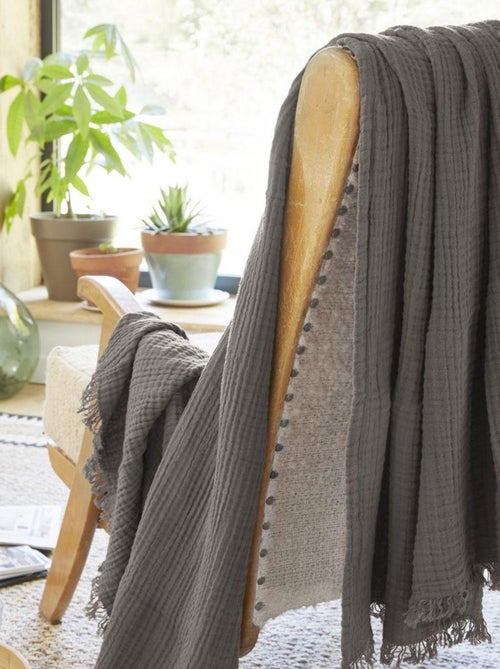Plaid à franges en Gaze de coton - Kiabi Plaid à franges en Gaze de coton - Kiabi