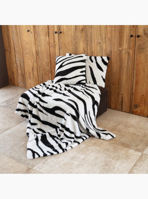 Plaid doux à motif zèbre avec dos en velours - Kiabi Plaid doux à motif zèbre avec dos en velours - Kiabi