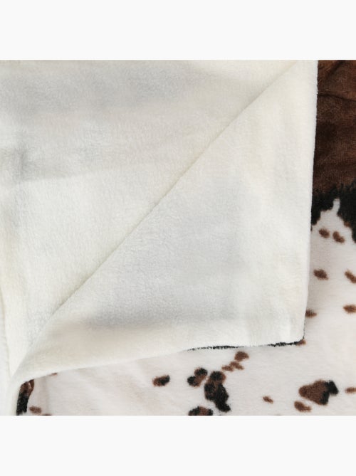 Plaid effet fourrure doublé polaire vache - Kiabi