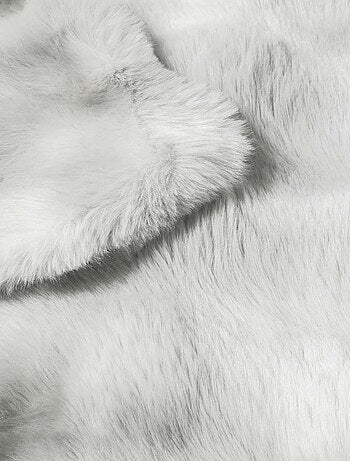 Plaid effet peluche et polaire