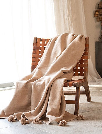 Plaid ou jeté de lit laine à pompons