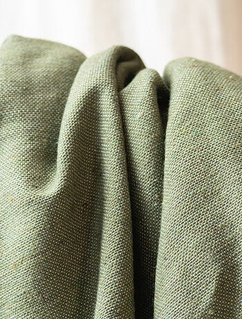 Plaid ou jeté de lit laine à pompons