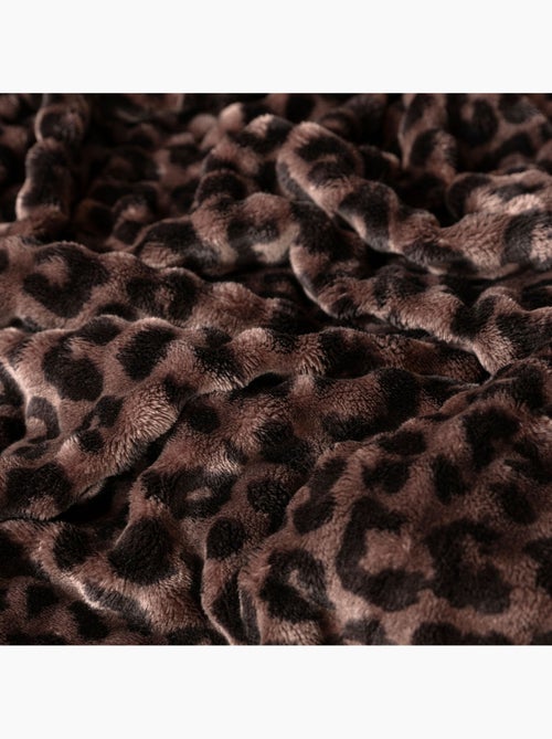 Plaid polaire cocooning bubble - terre de nuit - Kiabi Plaid polaire cocooning bubble - terre de nuit - Kiabi