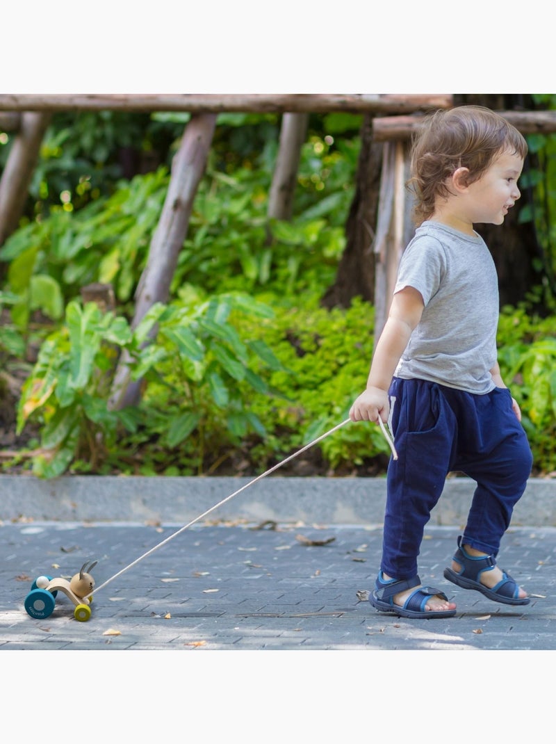 Plan Toys - Lapin sautillant à tirer Multicolore - Kiabi