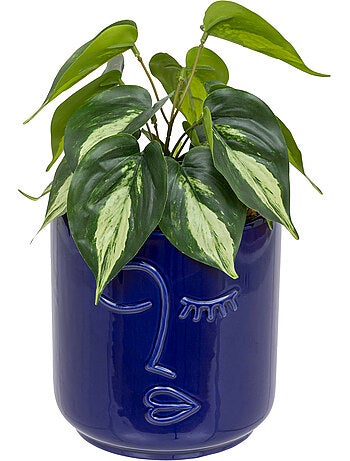 Plante artificielle avec pot en céramique à visage sculpté