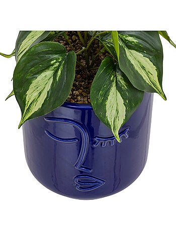Plante artificielle avec pot en céramique à visage sculpté