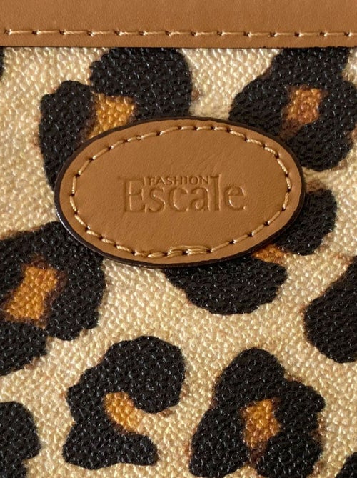 Pochette ou Porte-monnaie Léopard - Kiabi Pochette ou Porte-monnaie Léopard - Kiabi