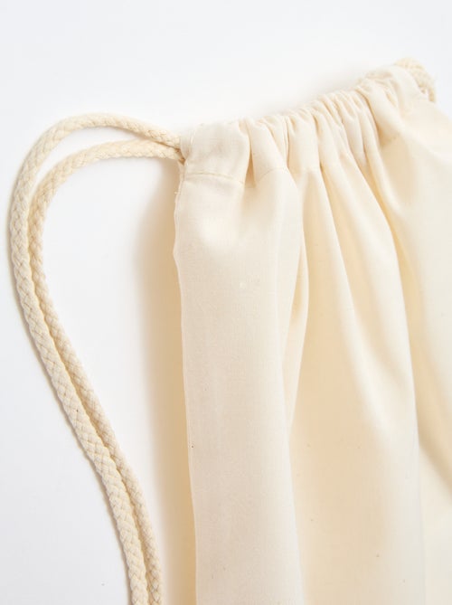 Pochon uni avec cordons - Kiabi Pochon uni avec cordons - Kiabi