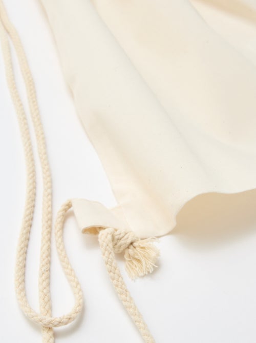 Pochon uni avec cordons - Kiabi Pochon uni avec cordons - Kiabi