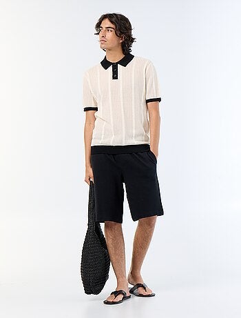 Polo à manches courtes en maille ajourée