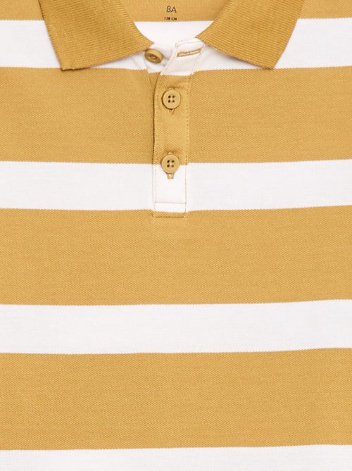 Polo à manches courtes en piqué de coton - Kiabi Polo à manches courtes en piqué de coton - Kiabi