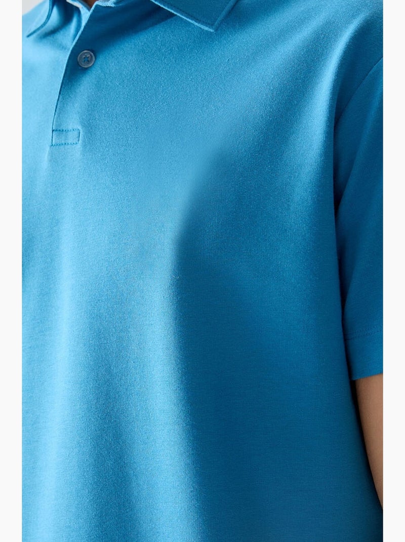 Polo ample tommy Bleu - Kiabi