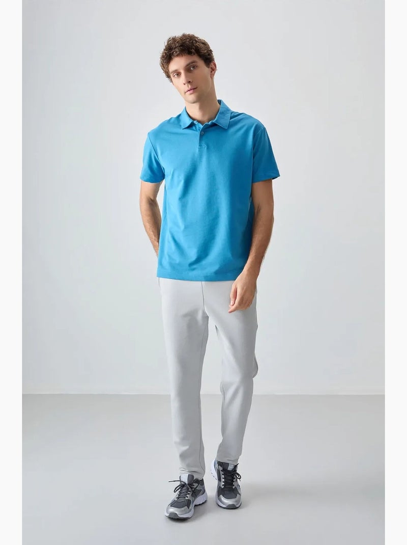 Polo ample tommy Bleu - Kiabi