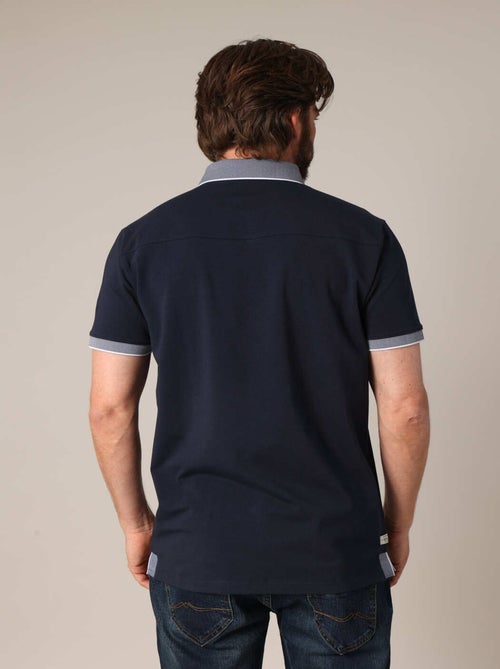 Polo avec col contrasté texturé et fausse poche poitrine 'Deeluxe' - Kiabi Polo avec col contrasté texturé et fausse poche poitrine 'Deeluxe' - Kiabi