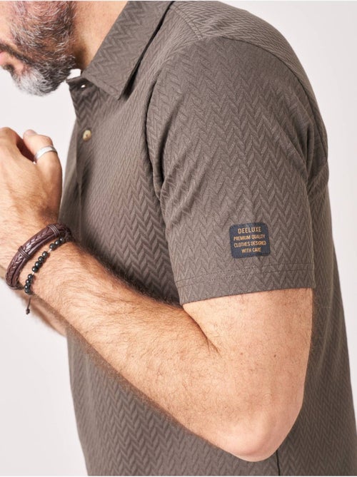 Polo confort homme en coton texturé 'Deeluxe' - Kiabi Polo confort homme en coton texturé 'Deeluxe' - Kiabi
