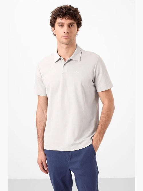 Polo coton élasthanne tommy - Kiabi Polo coton élasthanne tommy - Kiabi