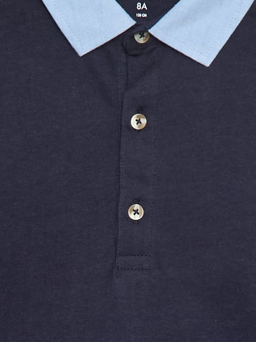 Polo effet 2-en-1 à manches courtes - Kiabi Polo effet 2-en-1 à manches courtes - Kiabi