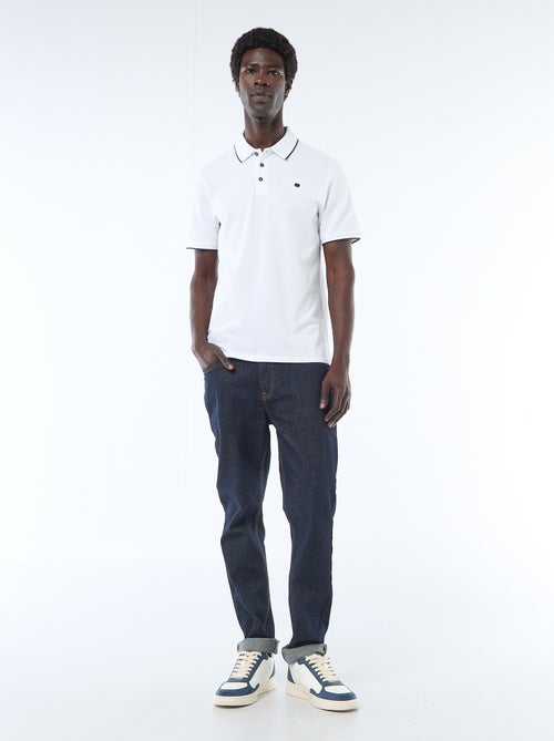 Polo en coton uni à manches courtes pour homme - Kiabi Polo en coton uni à manches courtes pour homme - Kiabi