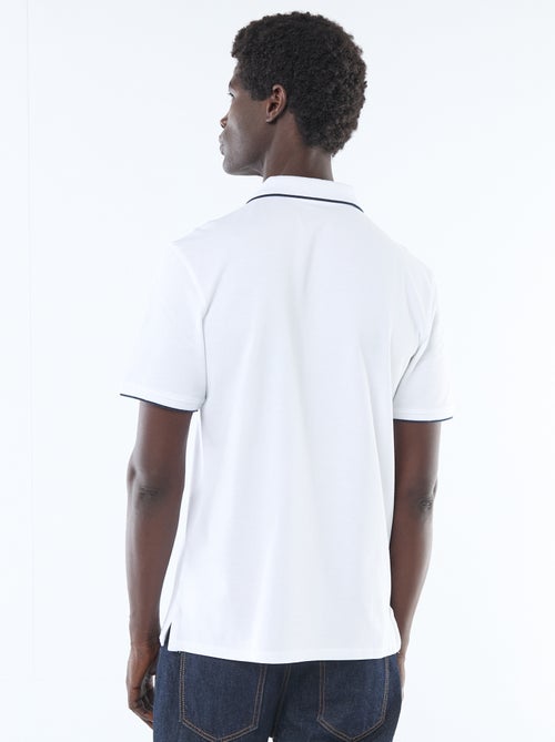 Polo en coton uni à manches courtes pour homme - Kiabi Polo en coton uni à manches courtes pour homme - Kiabi