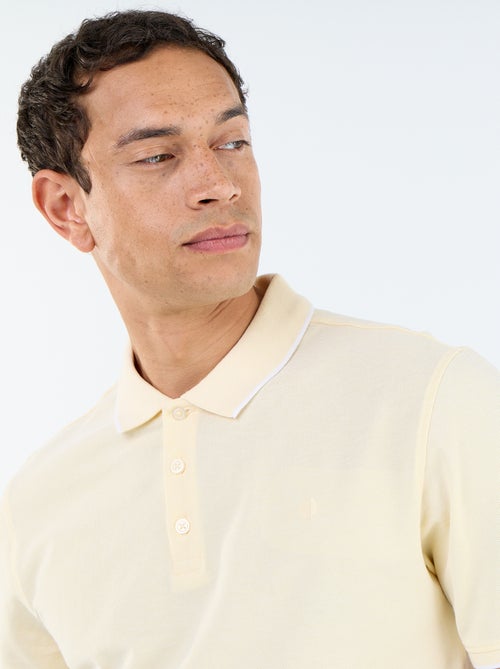 Polo en coton uni à manches courtes pour homme - Kiabi Polo en coton uni à manches courtes pour homme - Kiabi