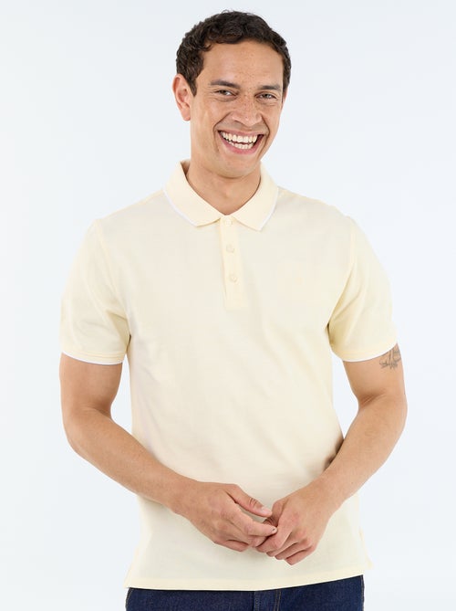 Polo en coton uni à manches courtes pour homme - Kiabi Polo en coton uni à manches courtes pour homme - Kiabi