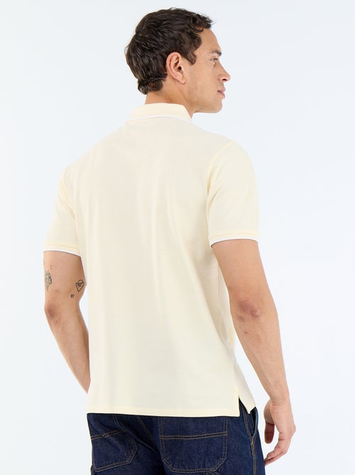 Polo en coton uni à manches courtes pour homme - Kiabi Polo en coton uni à manches courtes pour homme - Kiabi