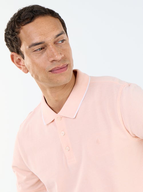 Polo en coton uni pour homme à manches courtes - Kiabi Polo en coton uni pour homme à manches courtes - Kiabi